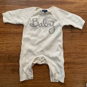 Baby Gap onesie, cream and gray.